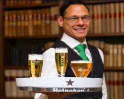 If you are a minor then you are not allowed to enter except accompanied by an adult and beverages with alcohol are not served according to Dutch law. 